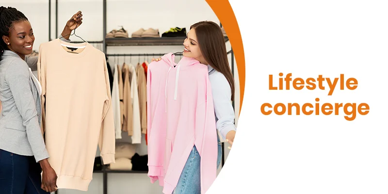 Two women smiling while holding clothes in a store, one with a beige sweater and the other a pink hoodie. The text beside them reads Personal & Lifestyle Concierge Services with an orange semicircle.